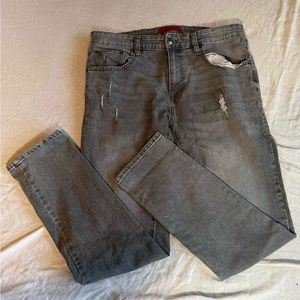 Grey jeans with small rip M.B.X